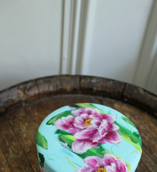 hand painted floral ceramic keepsake box background in a pale blue with pink peony flowers