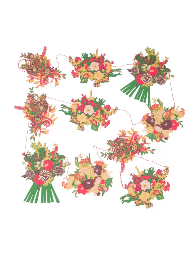 White cut-out of red bouquet floral shapes