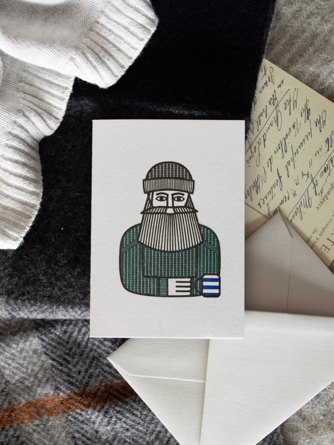 A cute mini risograph printed greeting card. Illustrated with a modern tea drinking character, a cool and unusual birthday card or Father's Day card for any tea loving man in your life.