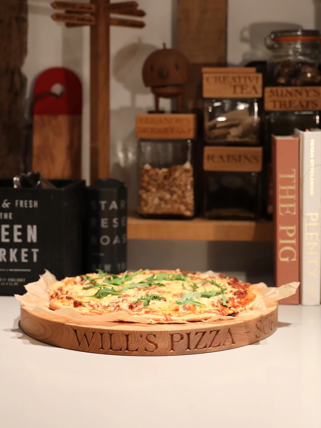 Personalised Oak Pizza Board - Round in a kitchen