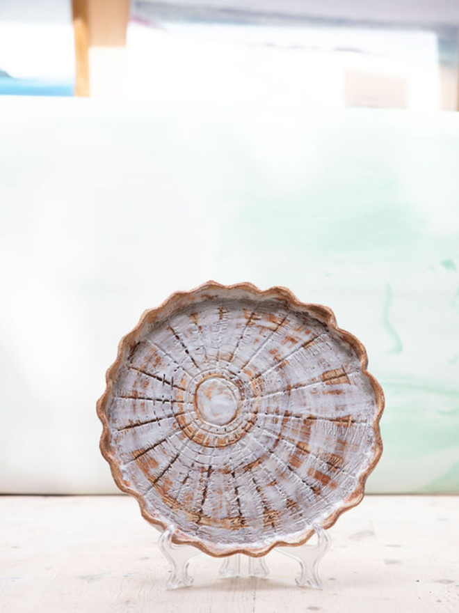 Ceramic shell plate