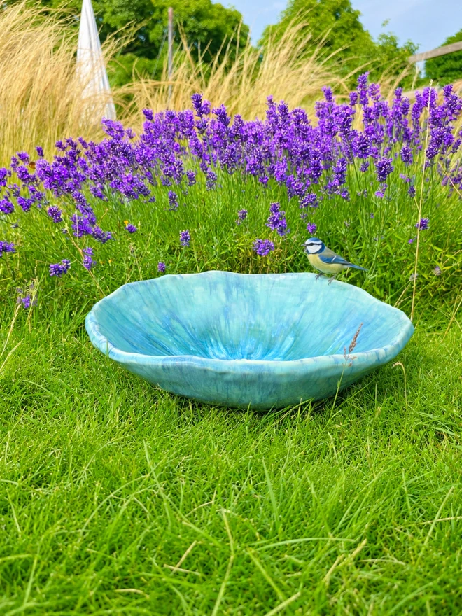 ceramic bird bath in blue glaze, jenny hopps pottery