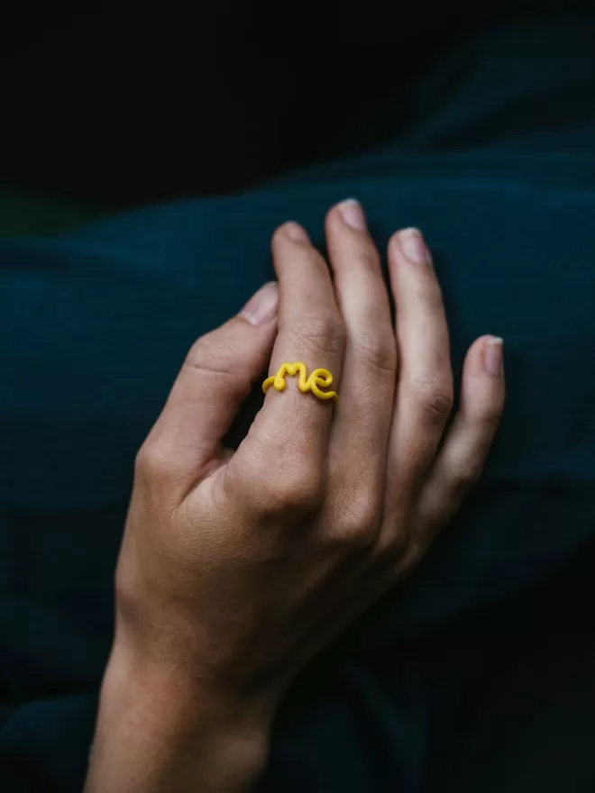 This Is 'Me' Statement Ring in yellow.