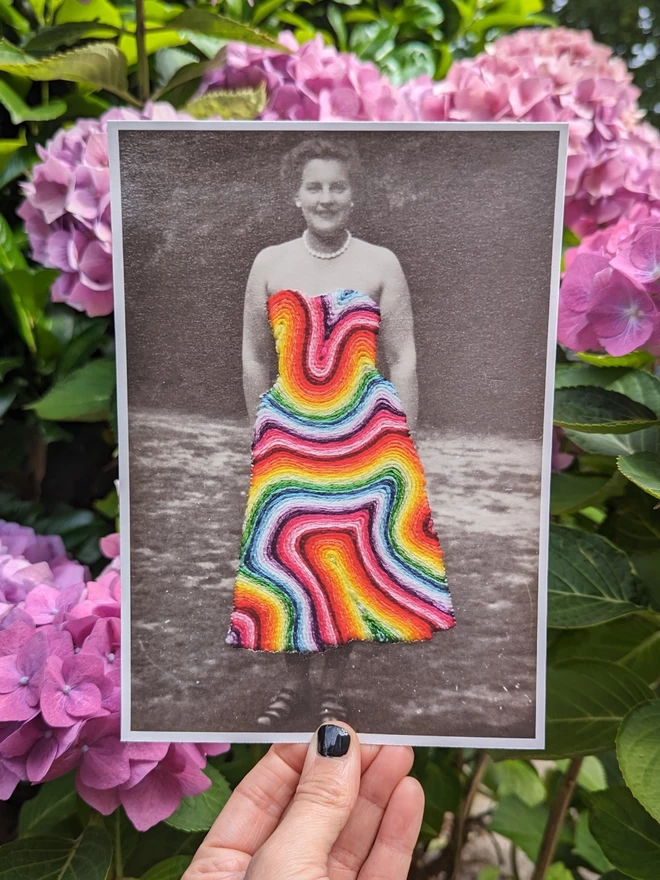 Print of rainbow coloured thread embroidered into vintage image of women in dress