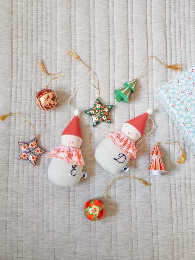 Stuffed linen Christmas tree decorations with alphabet initial embroidered