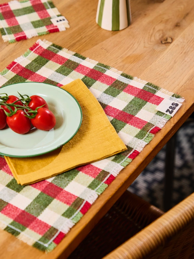 Sour Apple Placemats. A red and green placemat on a table