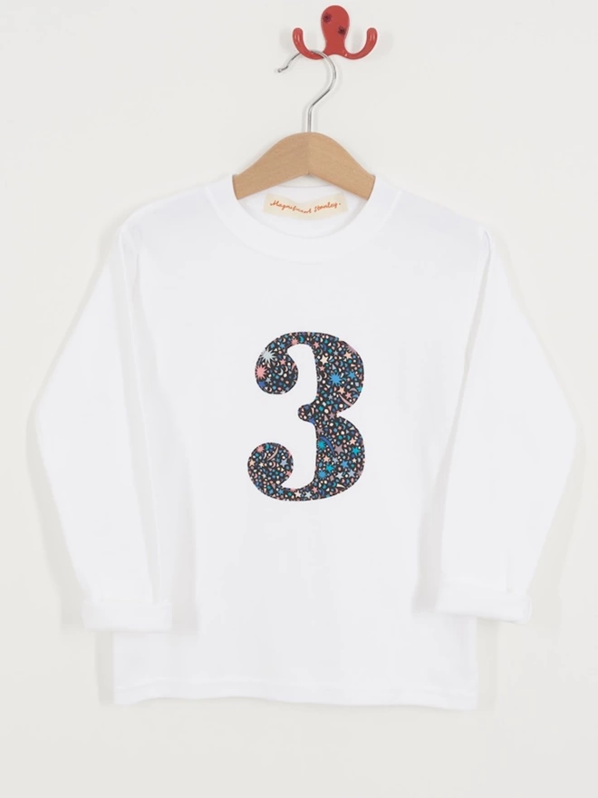 white long sleeve t-shirt with a number 3 sewn on in Liberty Fizz Pop Black print 