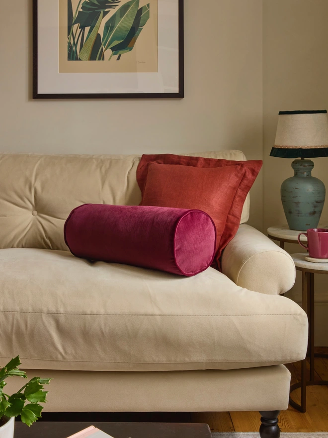 Handmade rust classic linen oxford cushion 45x45cm with feather pad on cream sofa, Kika Bespoke