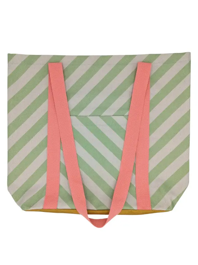 Tote Cotton Shopper Bag, a colourful patterned tote bag sitting on a plain white surface. 