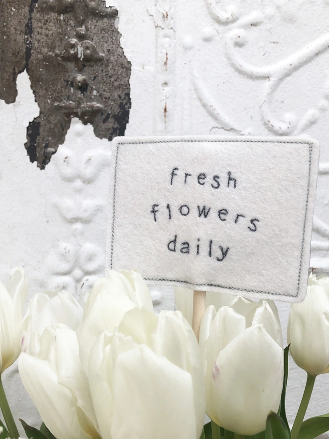 fresh flowers daily embroidered felt flower sign