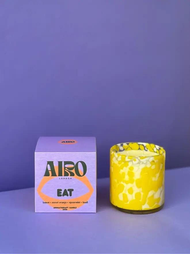 AIRO aromatherapy EAT candle in yellow glass