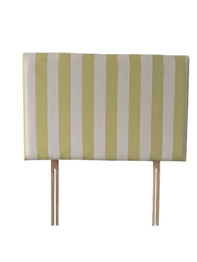 Hand Painted Upholstered Linen Headboard In Stripe Print, a metallic gold striped headboard sitting against a white background. 