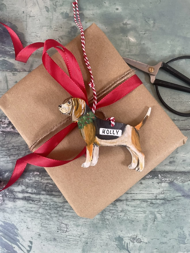 Beagle Christmas Decoration shown as a Christmas present tag