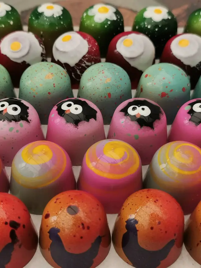 display of colourful easter-themed chocolate bon bons