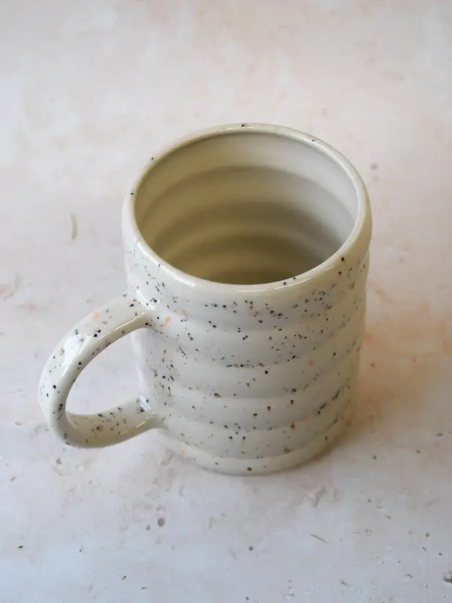 Speckle Pop’ handmade ceramic mug — top view showing speckled glaze and ridged texture