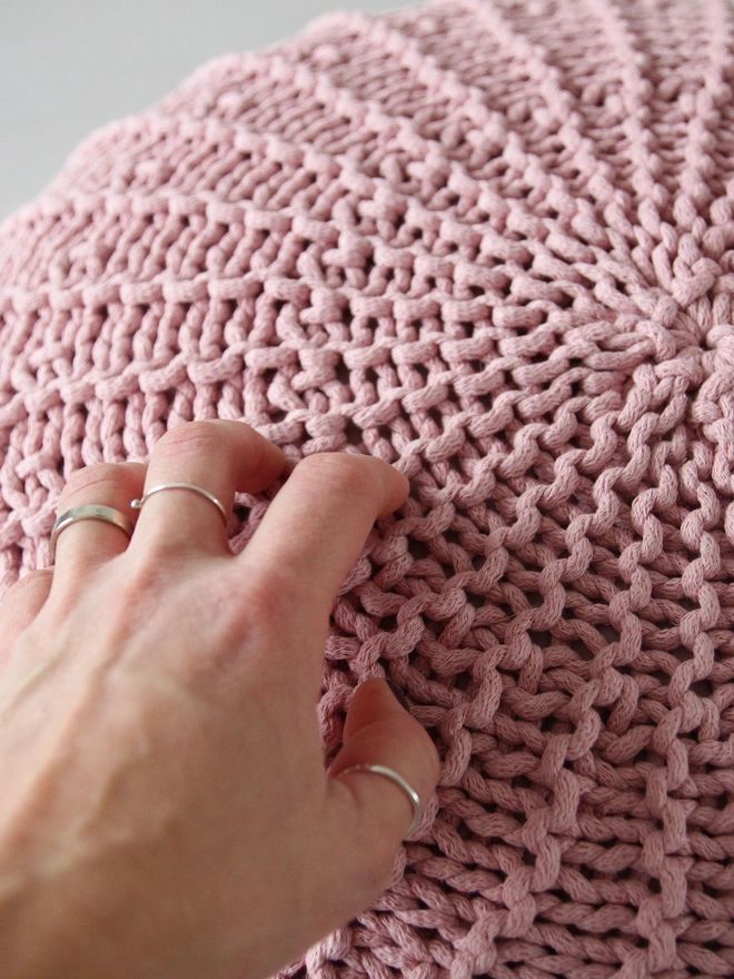 powder pink knitted pouffe 