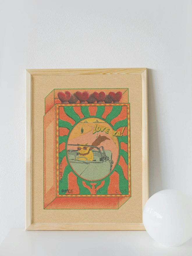 A playful burst of retro joy, Love Ya! captures a cool cat cruising through the desert in rose-tinted shades. Framed like a whimsical matchbox, the scene glows with sun-soaked oranges and greens, hand-textured grain, and heart-shaped match heads lining the top. Equal parts nostalgic and cheeky, this print blends vintage travel posters with pop surrealism—perfect for adding warmth and character to any space.  The laid-back feline, sunglasses on and paws at the wheel, radiates carefree confidence and a wink of humor. It’s a love letter to the open road, sweet moments, and saying “love ya” without taking things too seriously.  Details  High-quality art print with rich, textured color  Retro color palette with desert and sunset tones  Perfect for living rooms, studios, offices, or as a unique gift  Ships carefully packaged to protect the artwork