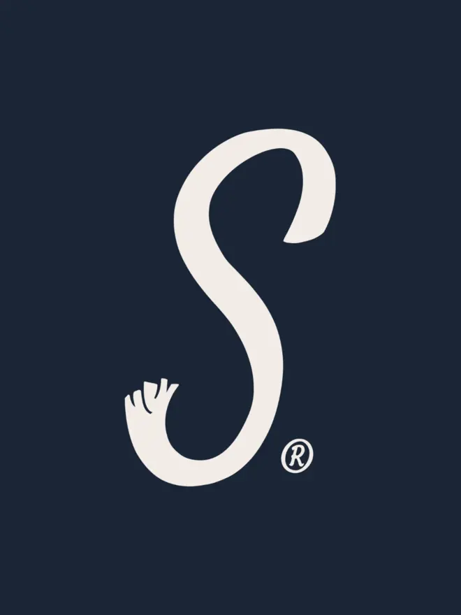 Strinsel logo - an cotton coloured capital S with frayed ends and registered trademark symbol on a midnight blue background