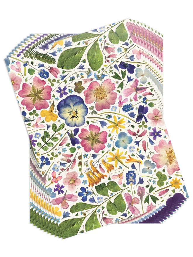 Set of 10 Folded wrapping paper sheets with a floral design created from pressed flowers.