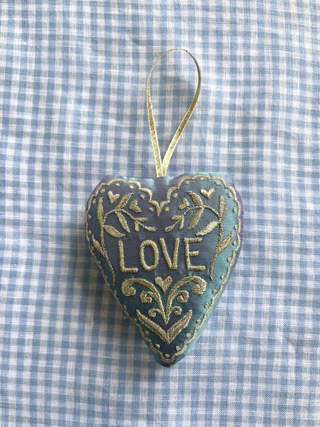 "LOVE" heart silk ornament with hearts, leaves and a scalloped edge (Pale blue silk with gold thread and a gold ribbon)