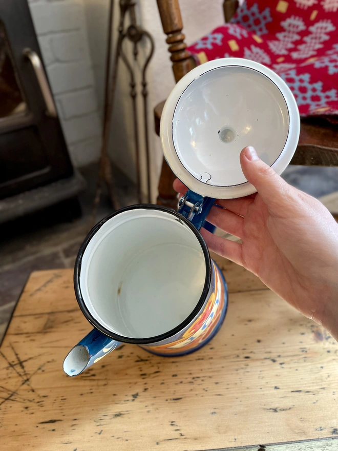 Inside of blue vintage coffee pot. Enamel is in pristine condition. 