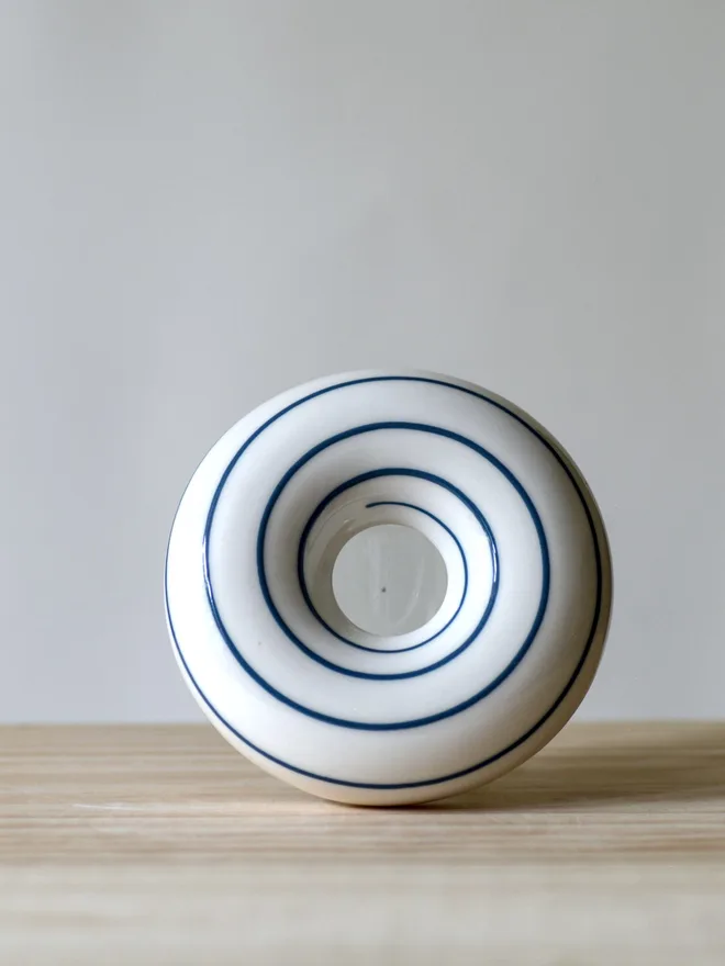 Avocado Planter White & Blue Handmade porcelain avocado planter with carved blue pattern, designed to hold an avocado seed for sprouting