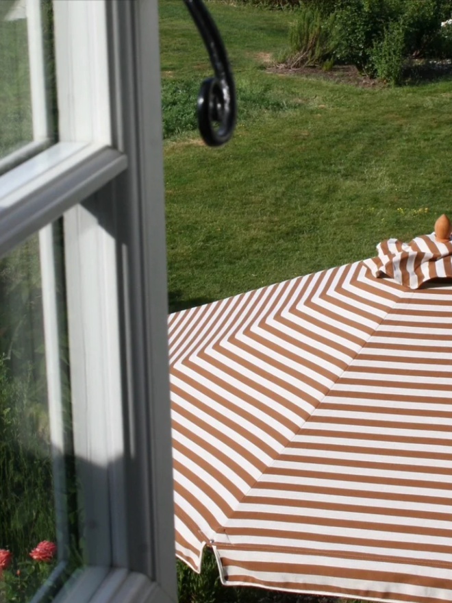 Striped Parasol. Parasol in camel.