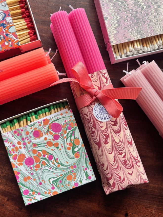 Scalloped Candles & Square Matchbox. A selection of the three shades of candle available, shown fully wrapped.