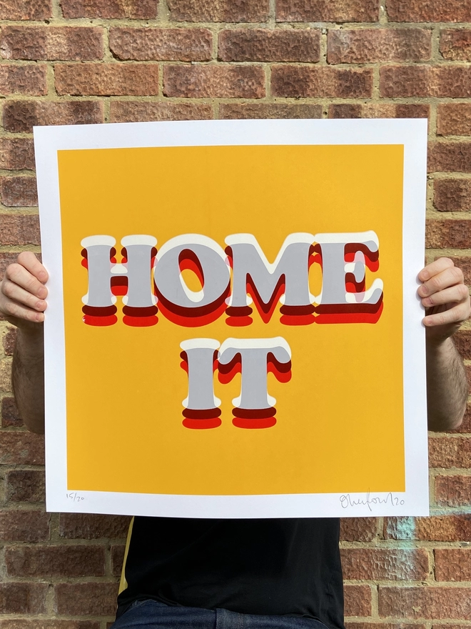 "Home it" Hand pulled Screen Print with layered typography on a deep yellow back ground that has “home it” printed on top in layered typography 
