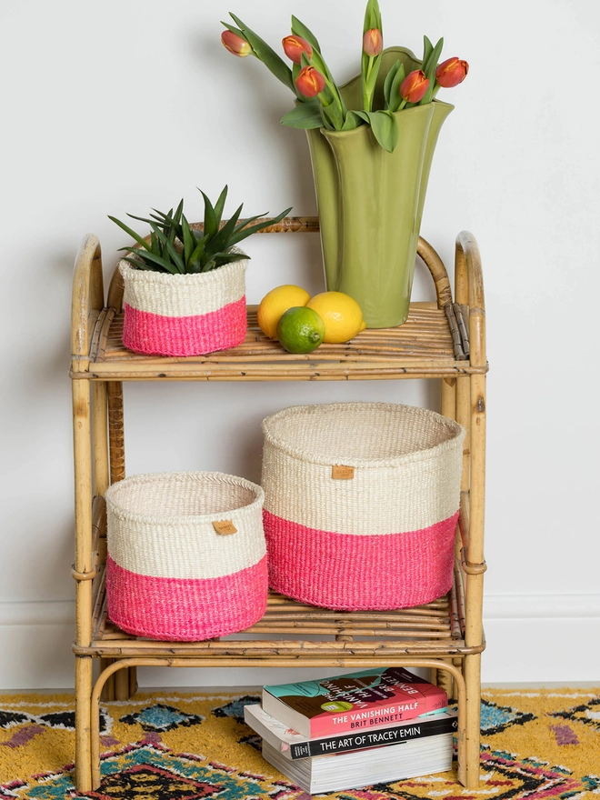 lifestyle showing pink colour block baskets