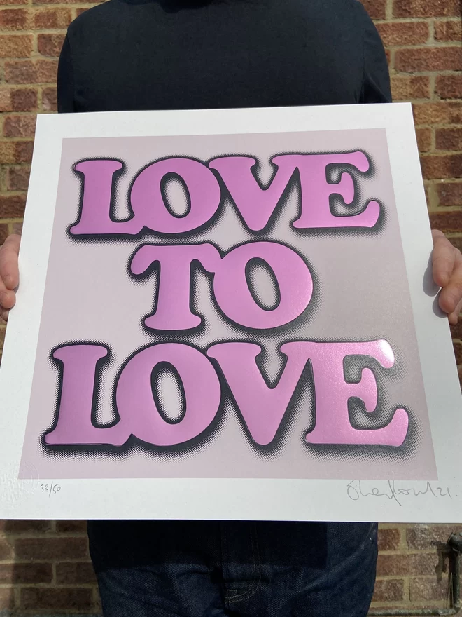 Metallic Hot Foil  "Love to Love" Screen Print in lilac. typography says love to love with a drop shadow the print is square 