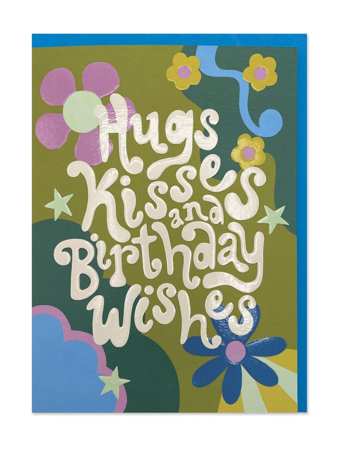  Birthday card with ‘Hugs, kisses and Birthday wishes’ message in chunky 70’s inspired hand lettering on a psychedelic pattern of olive and dark greens, complimented with pops of pink blue and mint