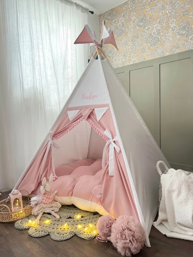 White & Dusty Pink Teepee. A pink and white teepee.