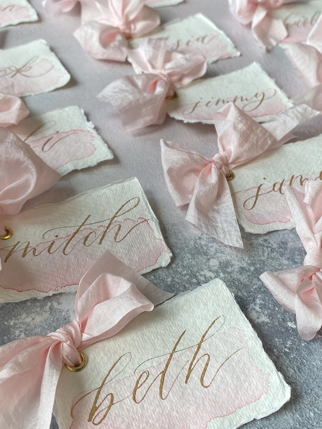 Watercolour wash blush pink placecards