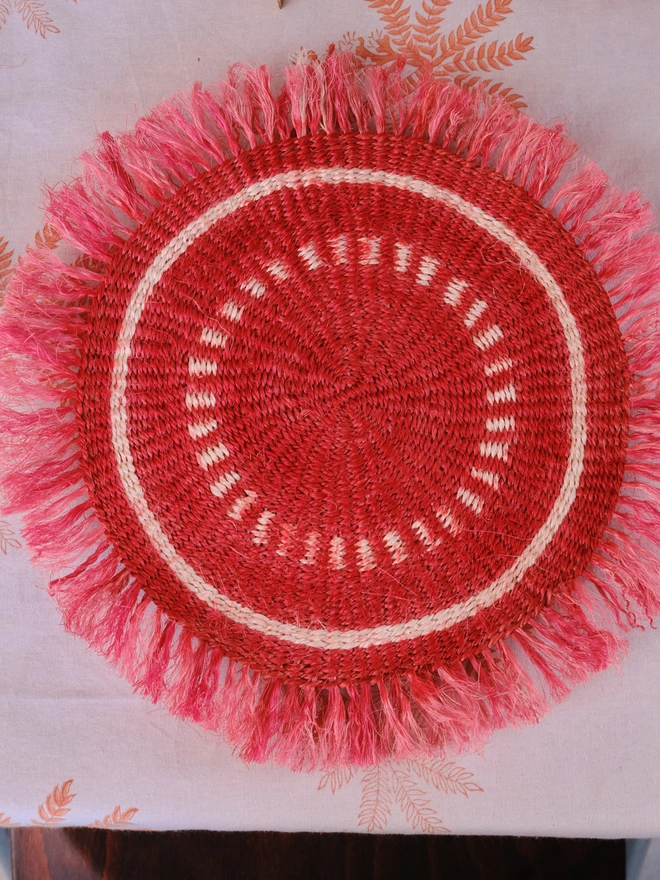 Aarven handwoven fringed placemat in teracotta
