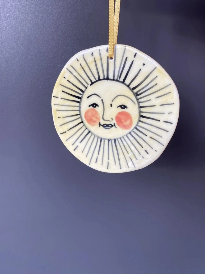 Hand-Painted Porcelain Sun Hanging Decoration