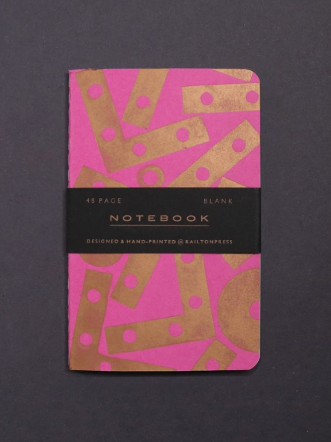 Blank Angle Notebook. A notebook in pink