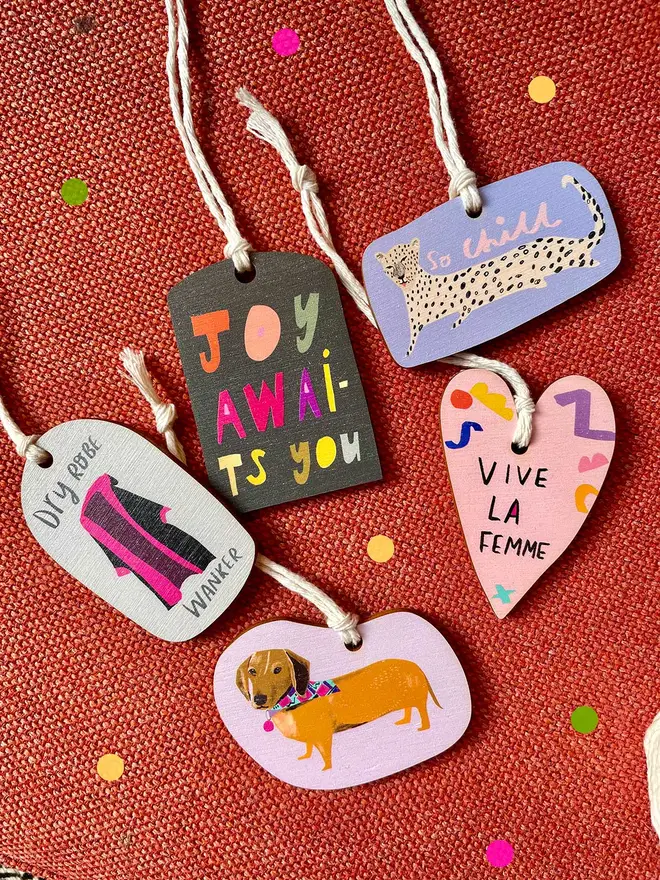 Check out the whole collection of wooden ornaments by Nicola!