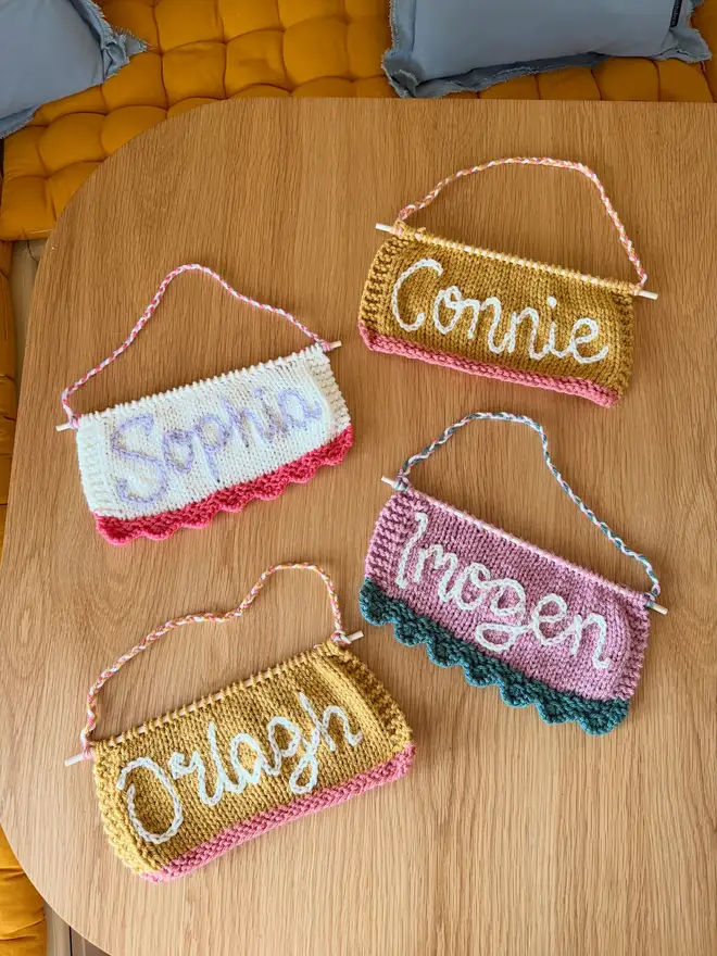 four scalloped banners