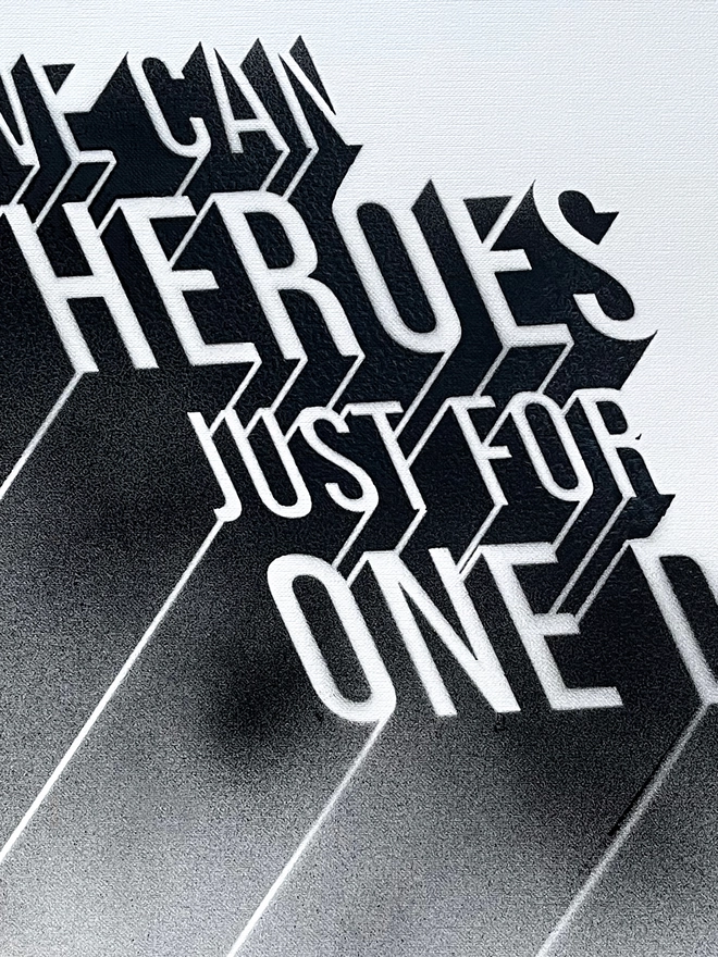 details of a typographic print featuring lyrics to David Bowie's Heroes