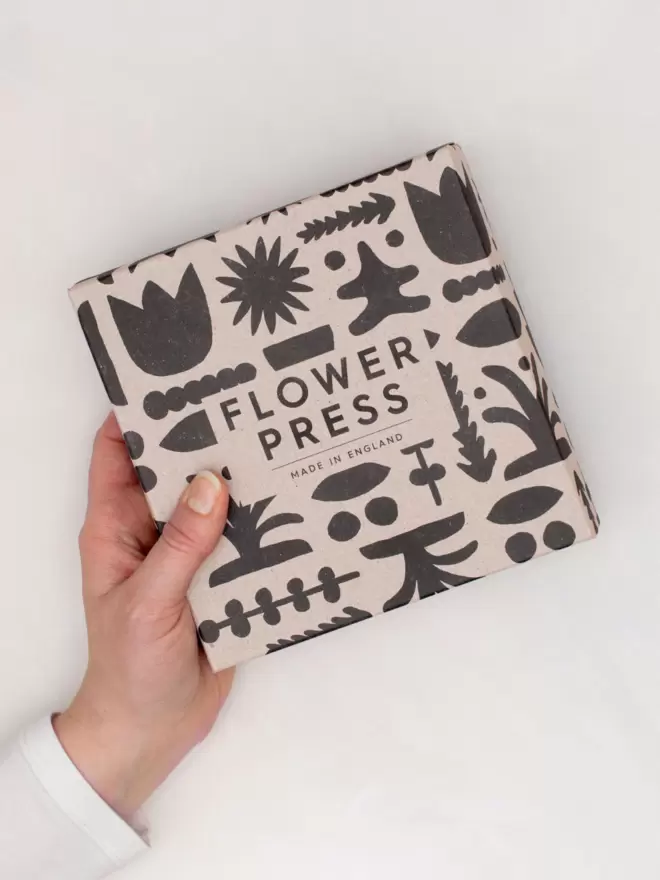 Square box for flower press with bold black abstract full wrap print.