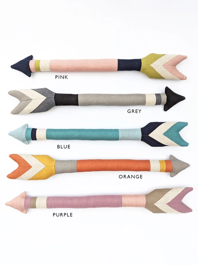 Colour variations of fabric arrow decoration.