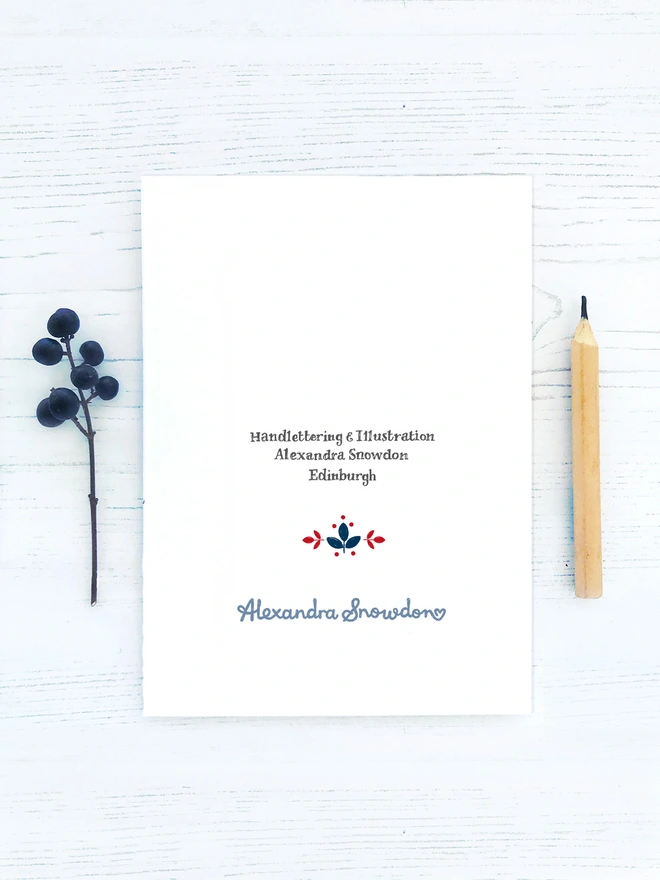back of card in red white and blue
