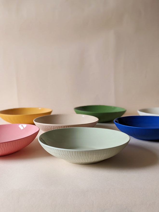 Porcelain Pasta Bowls with Carved Scallop Details In Light Rockpool Green, Milkshake Pink, Pale Oat and Dark Angelica Green