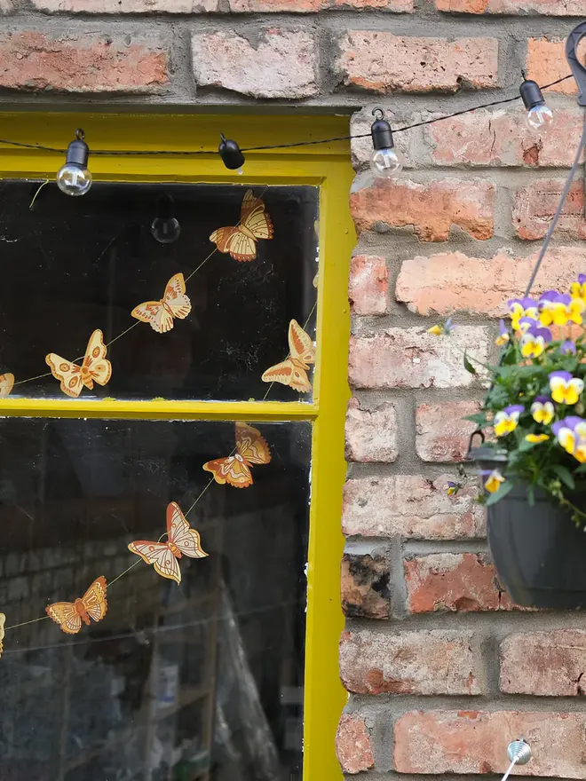 yellow british butterflies paper garland decoration