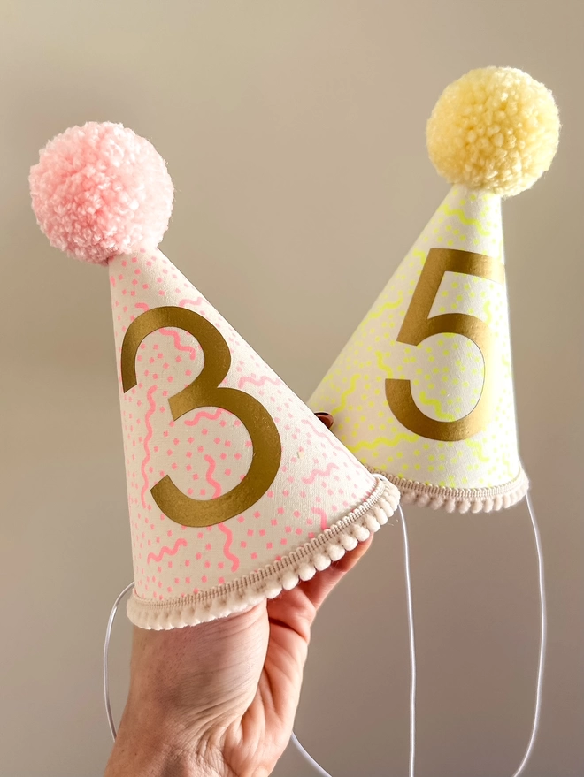 Pink and Yellow print party hats