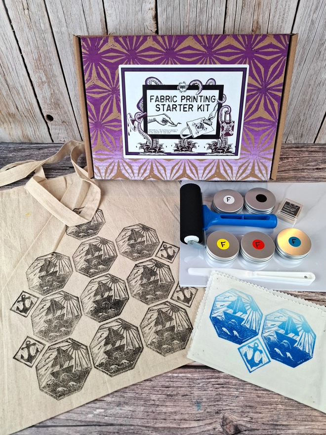 Fabric printing kit with fabric inks, brayer  and sample prints