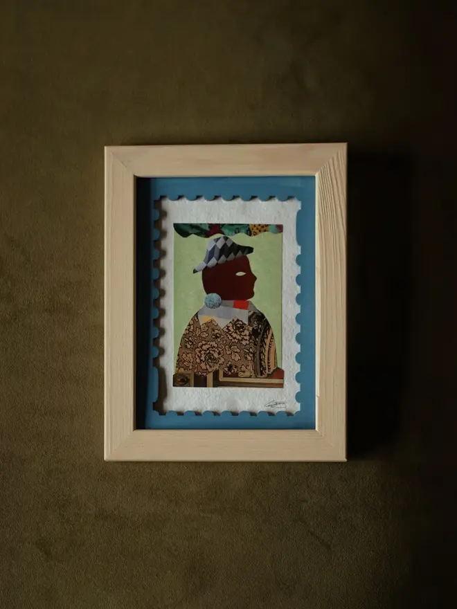 oat coloured flat wood picture frame hanging on wall