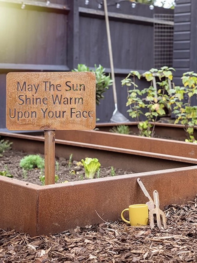 Personalised Garden Sign, in ground with stake saying: 'May The Sun Shine Warm Upon Your Face'.