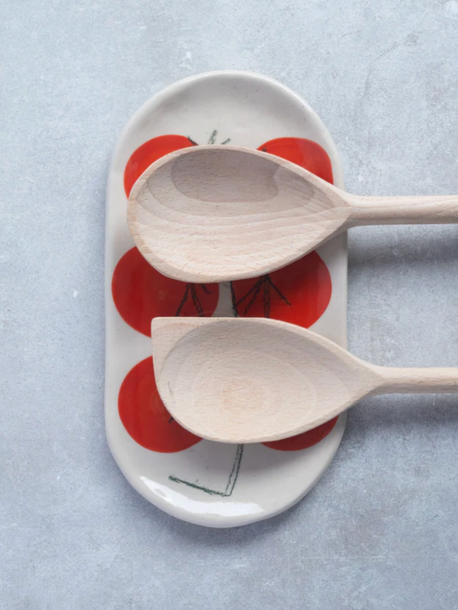 Medium Dish. A dish with a tomato design.